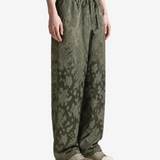 Green pants, full body view