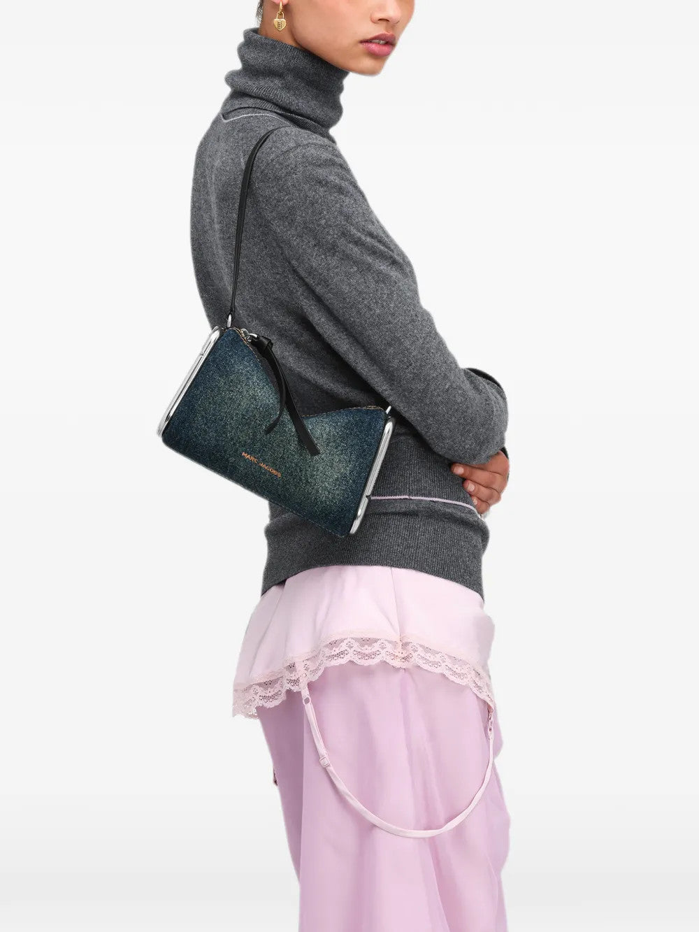 Blue bag worn by a person, showing the bag fit