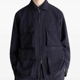 Black jacket worn by a person, showing the jacket's fit