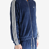 Navy hoodie worn by a person, showing the hoodie's fit