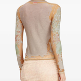 Tan top worn by a person, showing the top fit