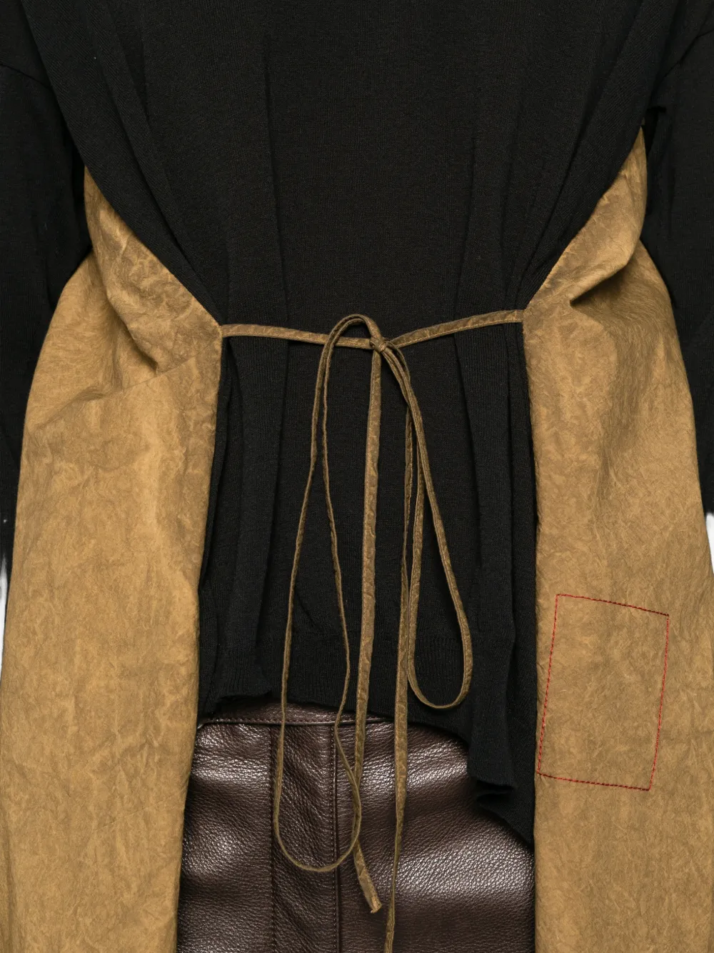 Close up of black knitwear, showing texture of the Cotton and Silk fabric