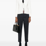 Whtie knitwear, full body view