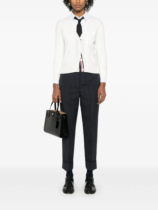 Whtie knitwear, full body view