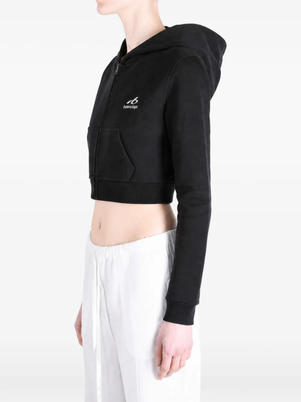 Black hoodie worn by a person, showing the hoodie's fit
