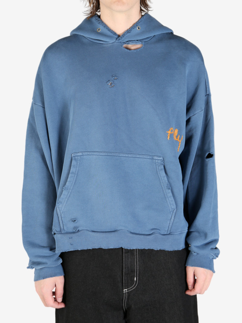 Navy sweatshirt worn by a person, showing the sweatshirt fit