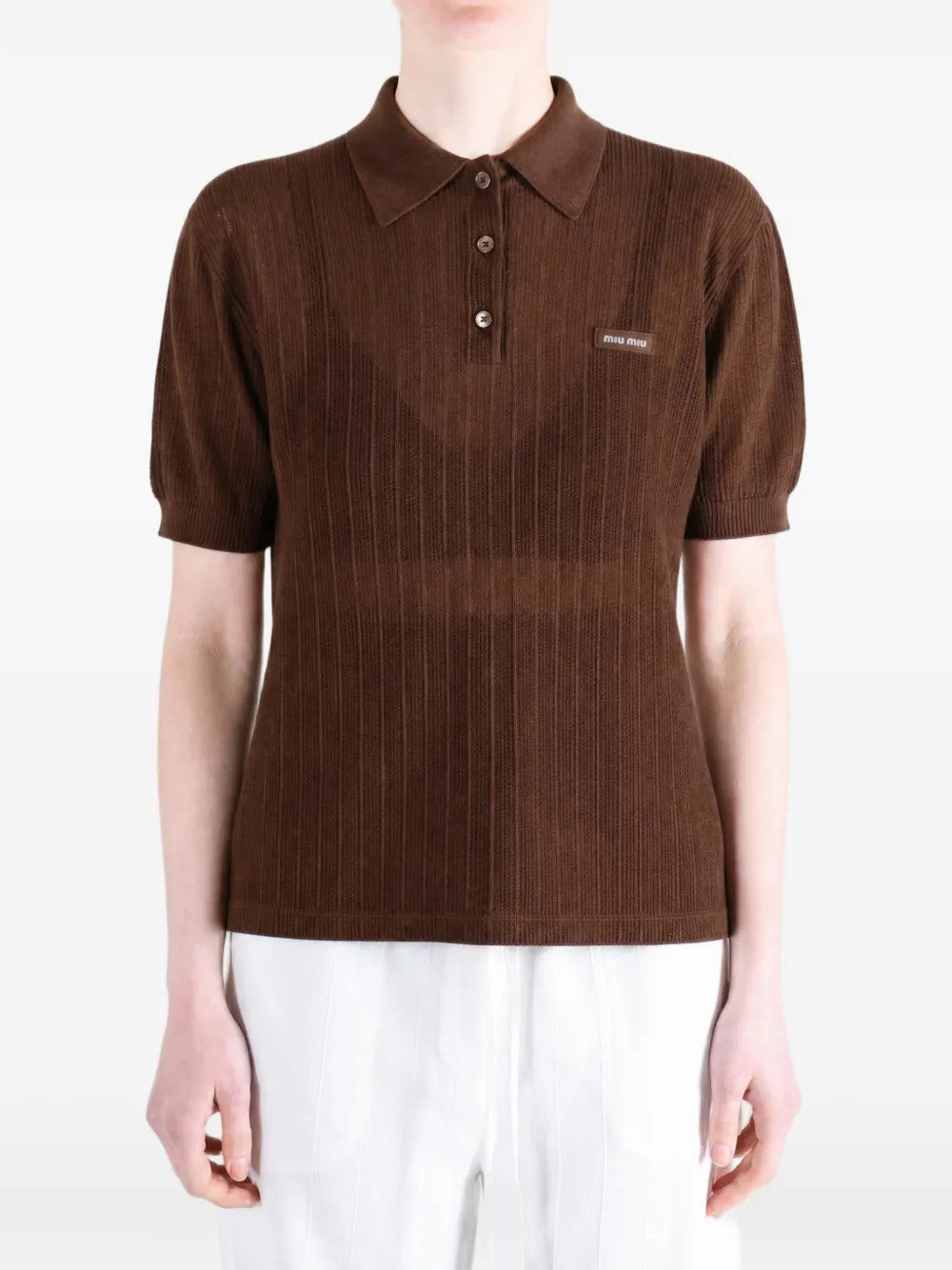 Brown shirt worn by a person, showing the shirt fit