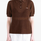 Brown shirt worn by a person, showing the shirt fit