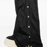 Close up of the black pants, showing texture of the nylon fabric