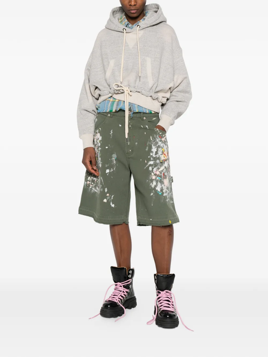 Green shorts, full body view