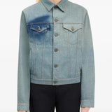 Blue jacket worn by a person, showing the jacket fit