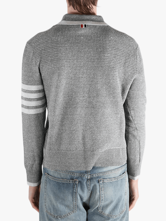 Grey t-shirt worn by a person, showing the t-shirt fit