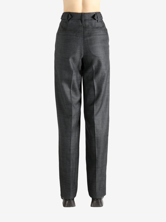 Grey pants worn by a person, showing the pants fit