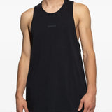 Black vest worn by a person, showing the vest's fit