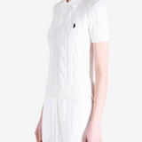 White t-shirt worn by a person, showing the t-shirt fit