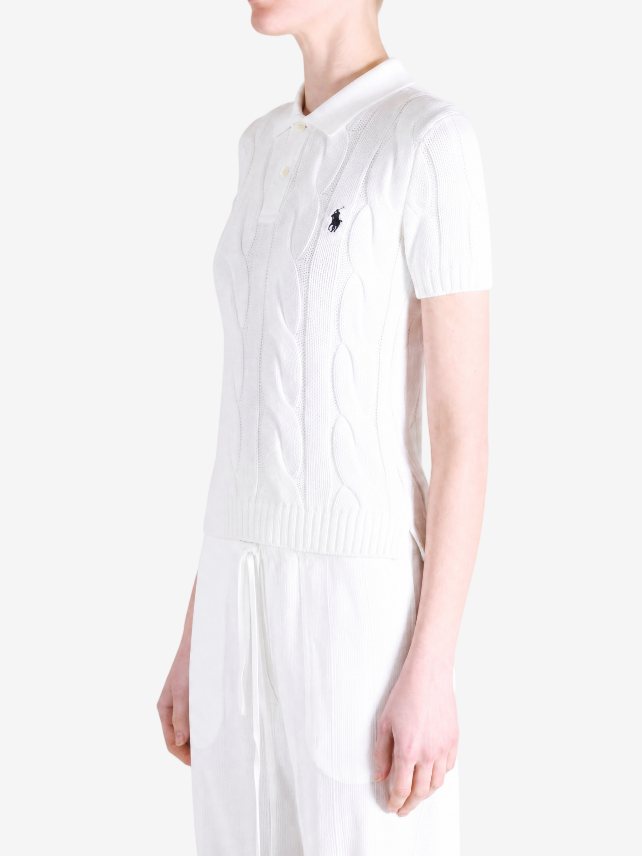 White t-shirt worn by a person, showing the t-shirt fit