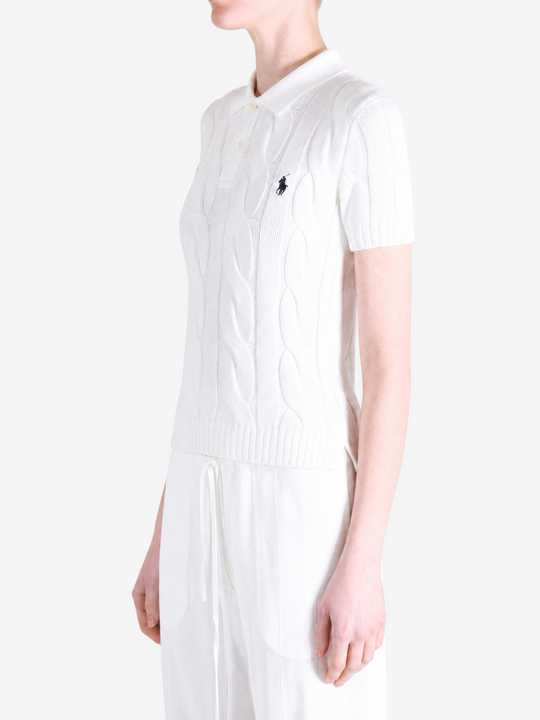 White t-shirt worn by a person, showing the t-shirt fit