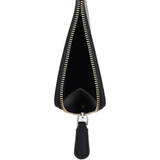 Close up of black bags, showing texture of the leather fabric