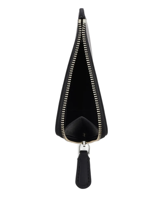 Close up of black bags, showing texture of the leather fabric