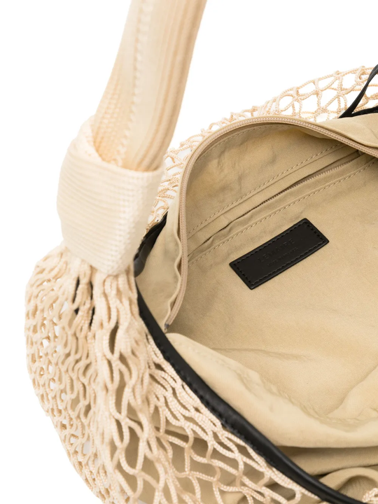 close up of brown bags, showing texture of the lamb fabric