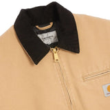 Close up of Tan jacket, showing texture of the 100% organic cotton made fabric