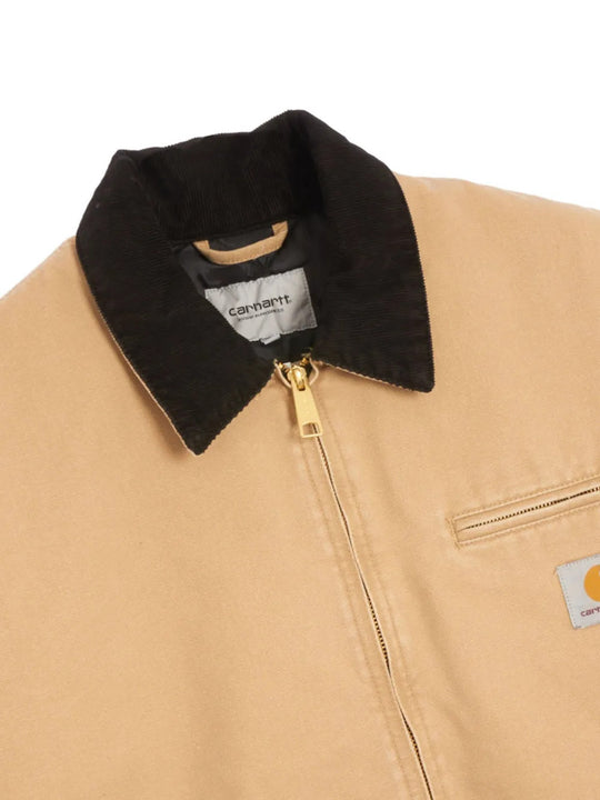 Close up of Tan jacket, showing texture of the 100% organic cotton made fabric