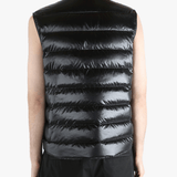 Black top worn by a person, showing the top's fit