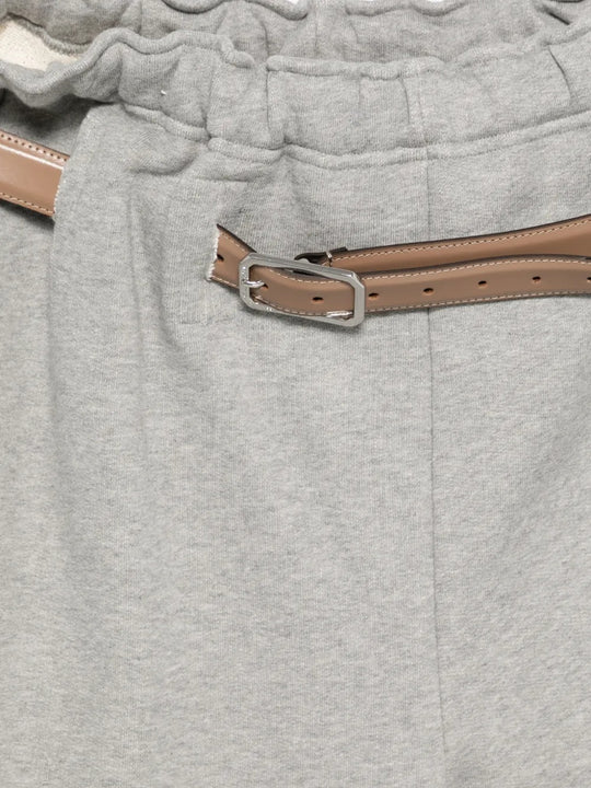 Close up of grey pants, showing texture of the cotton fabric