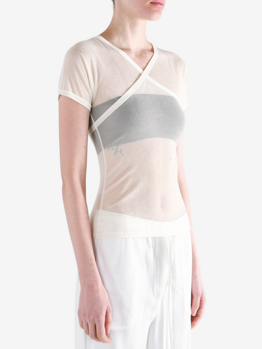 Tan top worn by a person, showing the top fit