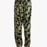 Camouflage pants worn by a person,showing the pants's fit