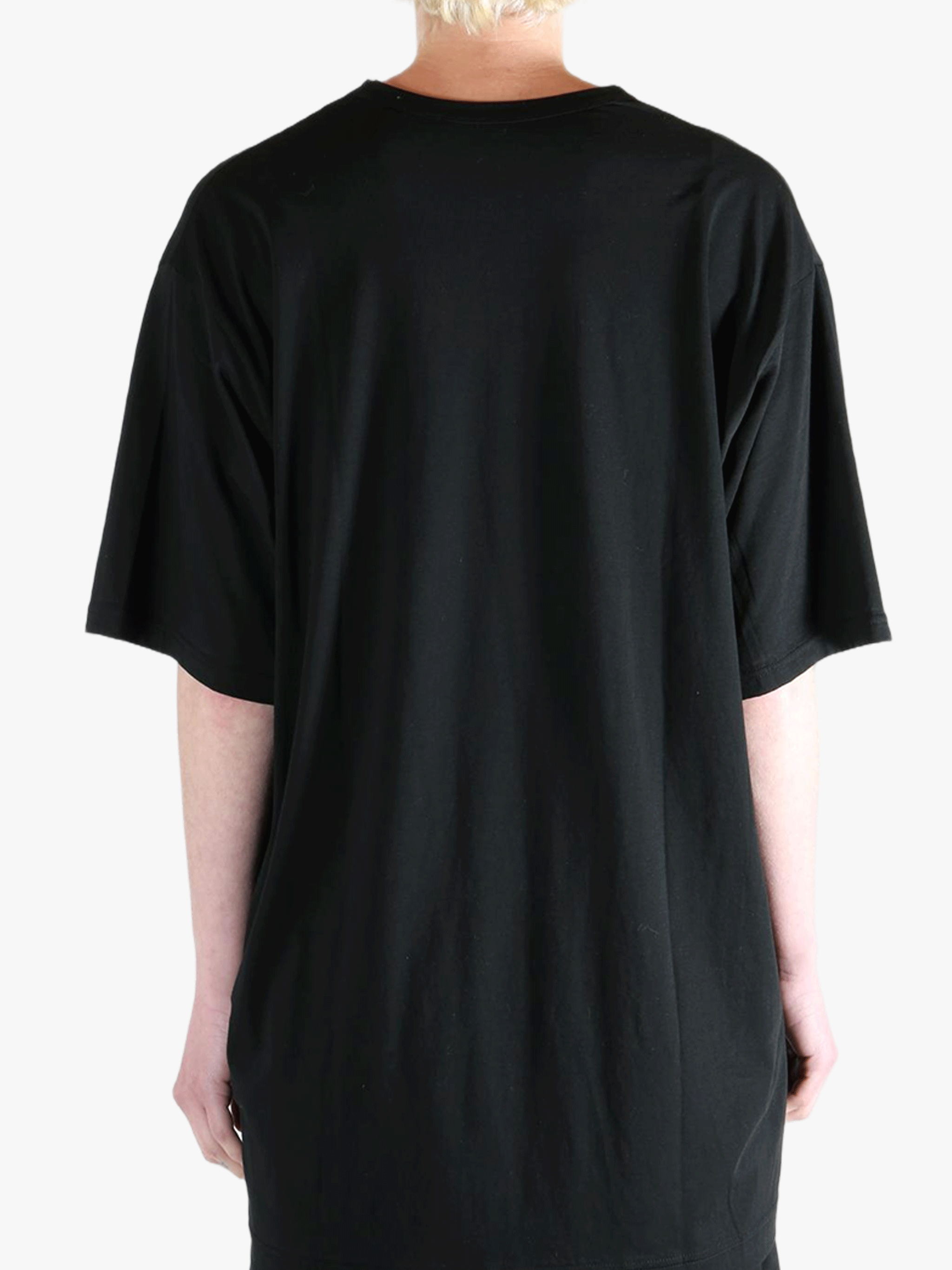 Black t-shirt worn by a person, showing the t-shirt's fit