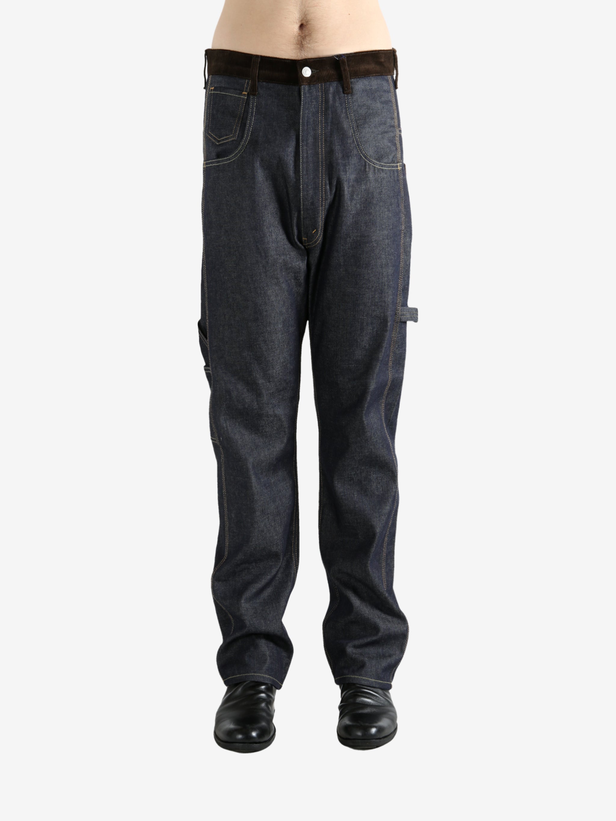 Blue jeans worn by a person, showing the jeans' fit