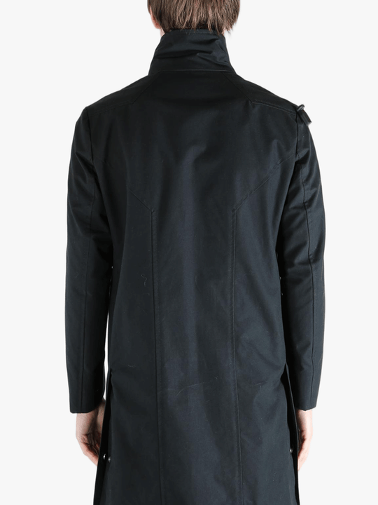 Black jacket worn by a person, showing the jacket's fit