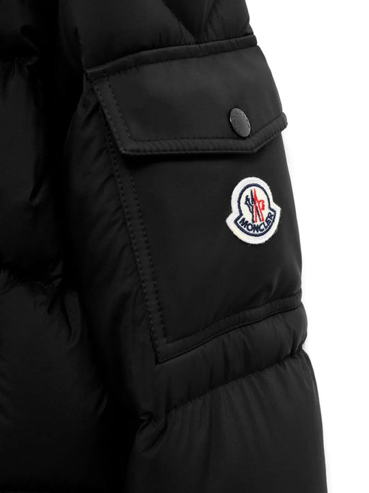 Close up of Black jacket, showing texture of the 100% polyamide fabric