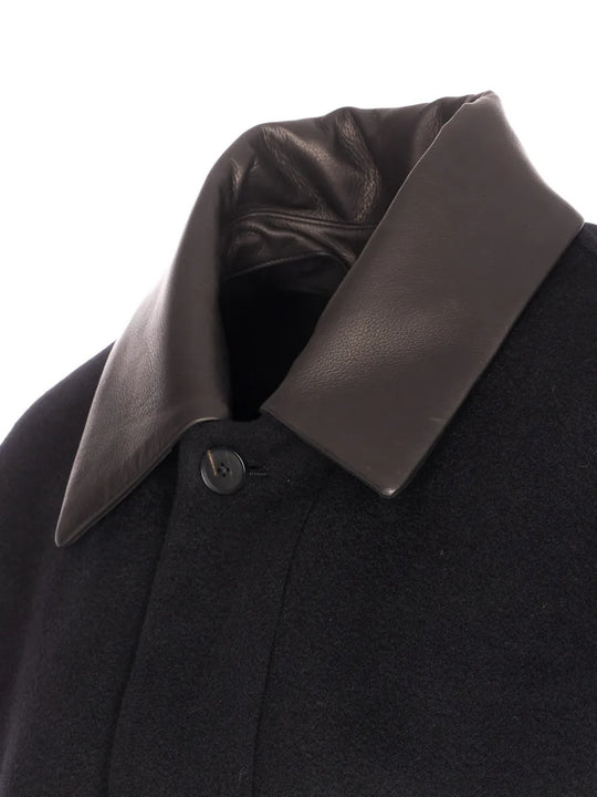 Close up of black jackets, showing texture of the cashmere fabric
