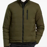 Green jacket worn by a person, showing the jacket fit