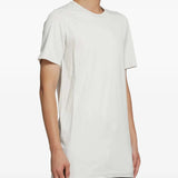 White t-shirt worn by a person, showing the t-shirt fit