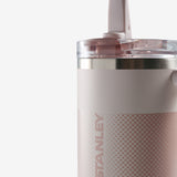 Close up of pink tumbler, showing texture of the stainless steel fabric