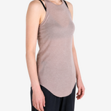 Tan top worn by a person, showing the top fit