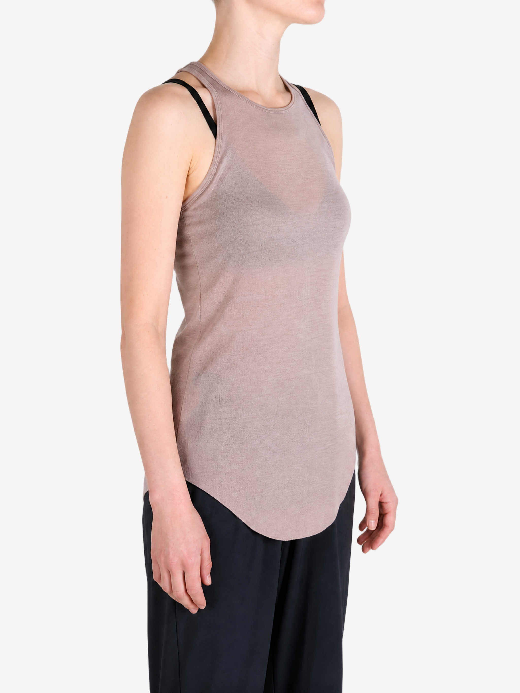 Tan top worn by a person, showing the top fit
