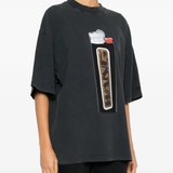 black t-shirts worn by a person, showing the t-shirts fit