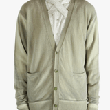 Light green cardigan worn by a person, showing the cardigan fit