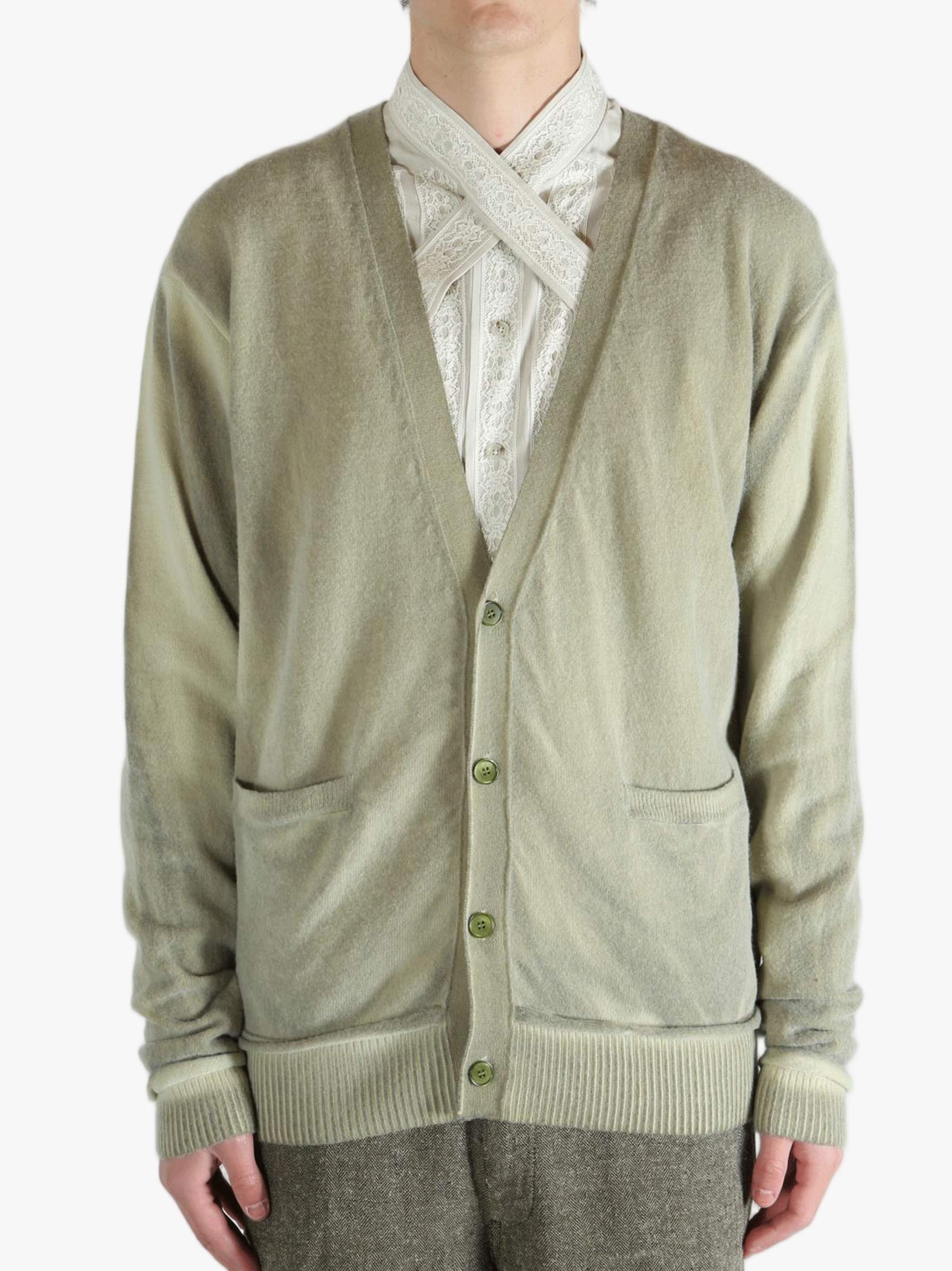 Light green cardigan worn by a person, showing the cardigan fit