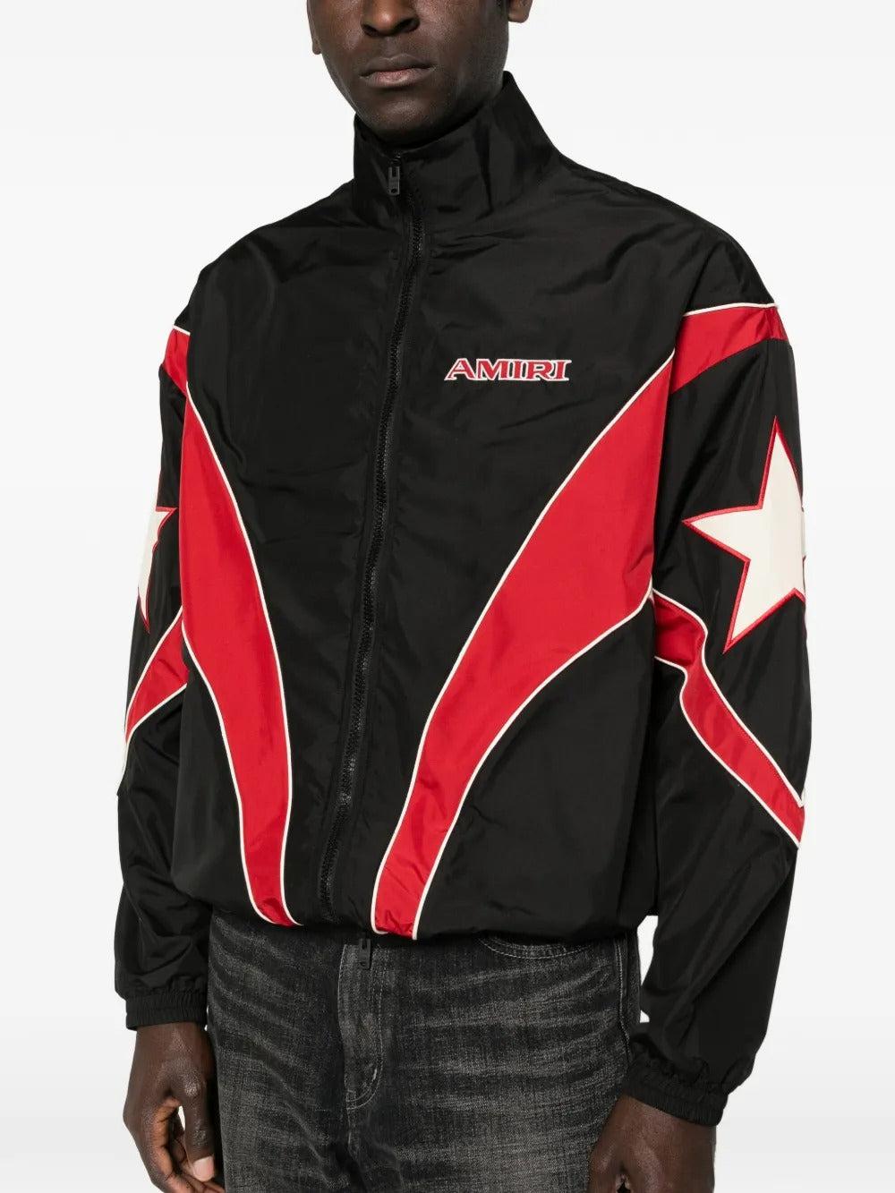 Black jackets worn by a person, showing the jackets fit