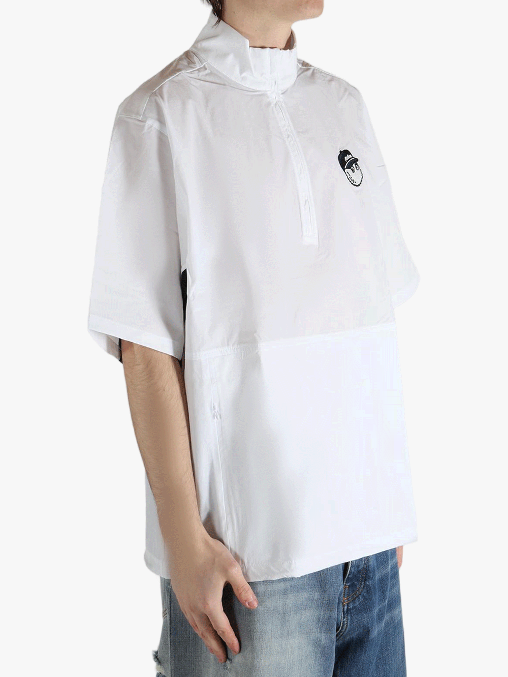 white t-shirts worn by a person, showing the t-shirts fit