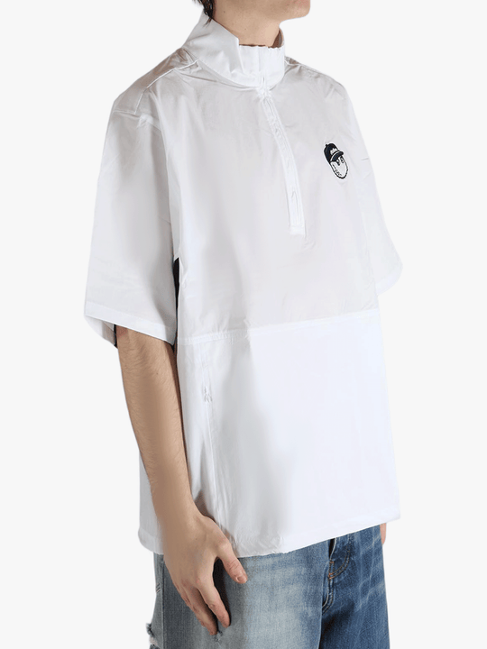 white t-shirts worn by a person, showing the t-shirts fit