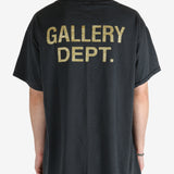 Black t-shirt worn by a person, showing the t-shirt's fit