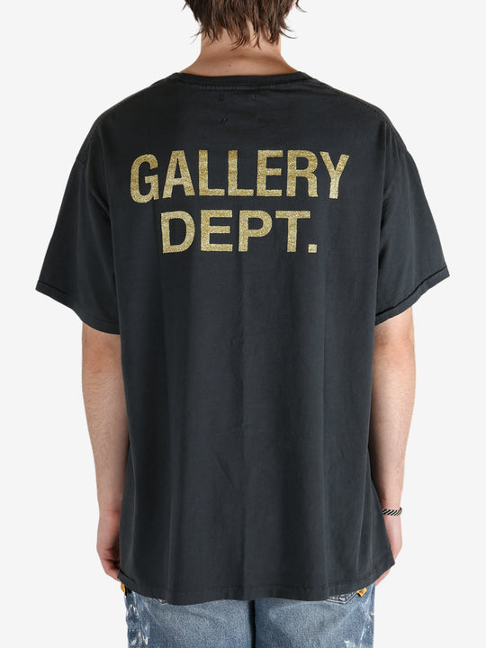 Black t-shirt worn by a person, showing the t-shirt's fit