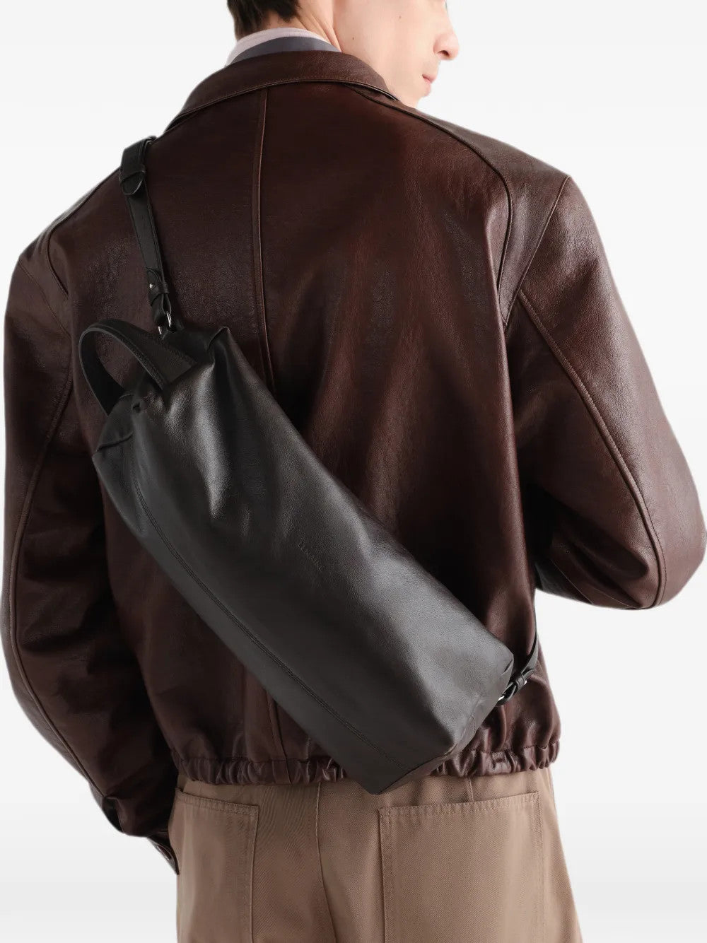 Brown bag worn by a person, showing the bag fit