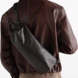 Brown bag worn by a person, showing the bag fit